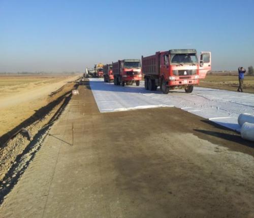 Laying of geotextile between base and pavement PK753+20 Laying of geotextile between base and pavement PK753+20