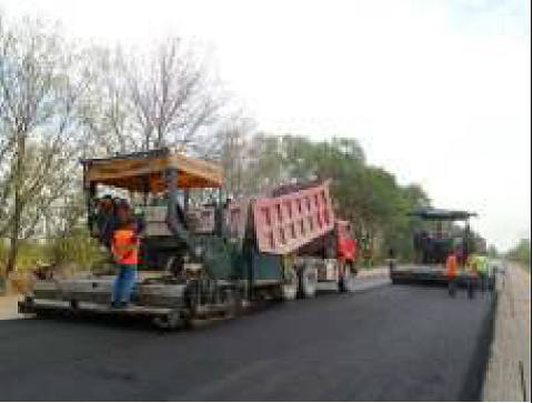 Placing wearing course Km 216+700 Placing wearing course Km 216+700