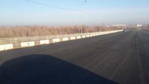 Asphalt-concrete pavement on bridge Arys under existing road Asphalt-concrete pavement on bridge Arys under existing road