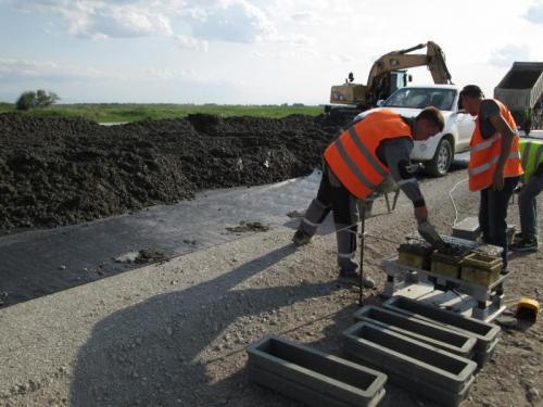 Taking cubes from cement concrete pavement at CH 385+00 Taking cubes from cement concrete pavement at CH 385+00