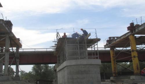 Progress of work of Company "OHL ZS" JSC lot 8 (bridge over the river Ili km 283). June 2015. Progress of work of Company "OHL ZS" JSC lot 8 (bridge over the river Ili km 283). June 2015.