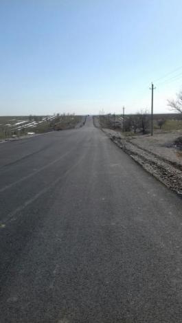 Asphalt concrete pavement on existing road Asphalt concrete pavement on existing road
