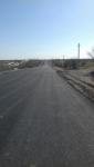 Asphalt concrete pavement on existing road