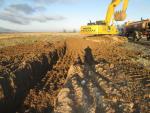 ПК138-ПК125.Устройство водоотводных траншей вдоль дороги. Правая сторона.  