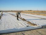 Laying a geotextile and construction of subbase  