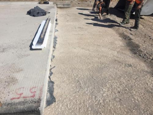 Base under transition slab 628+55-628+59 RHS