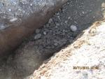 PK 140. Relacation of waterpipes installed with violations.  Incorrectly paved bed, oversize material, there is  mud (slurry) 