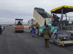 Second layer of asphalt in the approach slab of the overpass at pk 3+25 Masak side