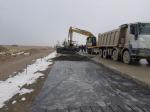 Concrete widening of exit for Burundusu village at pk 233+00 LHS
